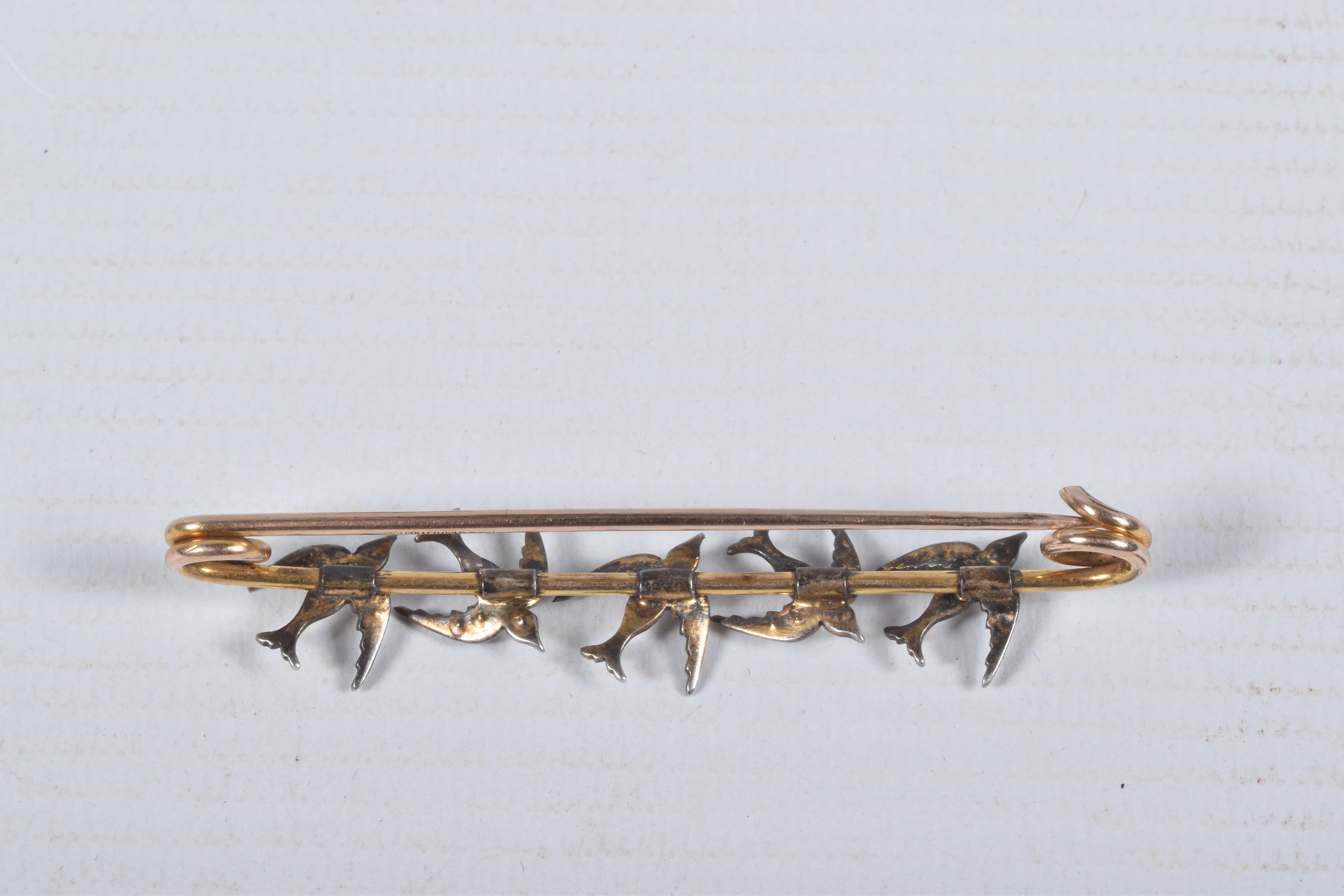 A SWALLOW BAR BROOCH, designed as five swallows set with imitation split pearls and blue paste - Image 2 of 3