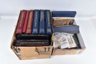 COLLECTION IN 2 BOXES INCLUDING CIGARETTE CARDS AND STAMPS. The stamps seem to be centered around