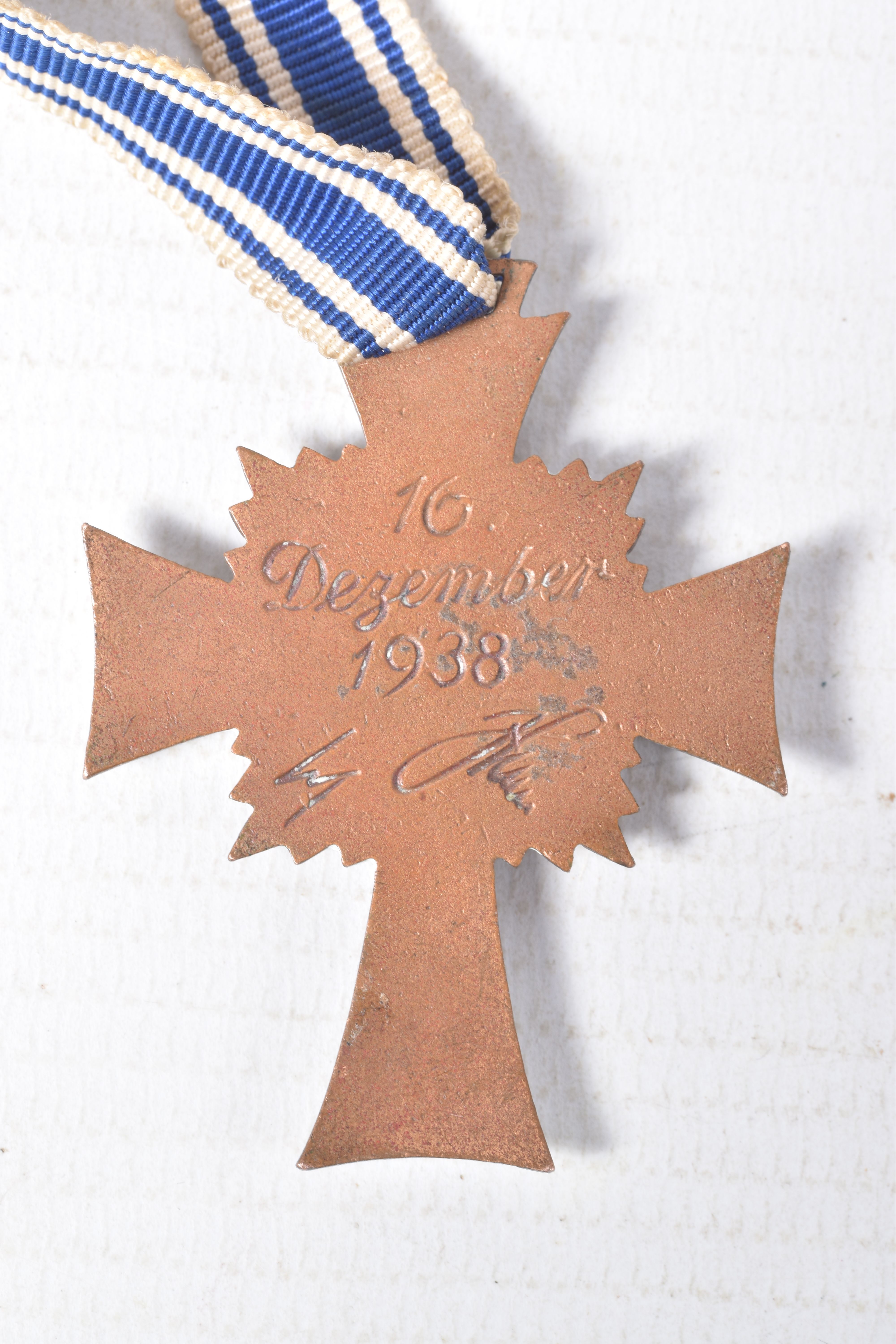 FOUR WWII GERMAN MEDALS AND AWARDS, this lot includes a bronze mothers cross, a war merit cross - Image 4 of 10