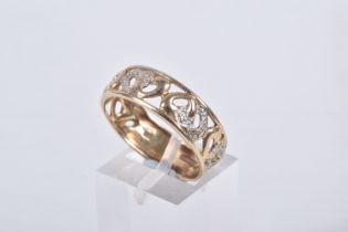 A 9CT GOLD BAND RING, open work wide band, detailed with hearts set with single cut diamond accents,
