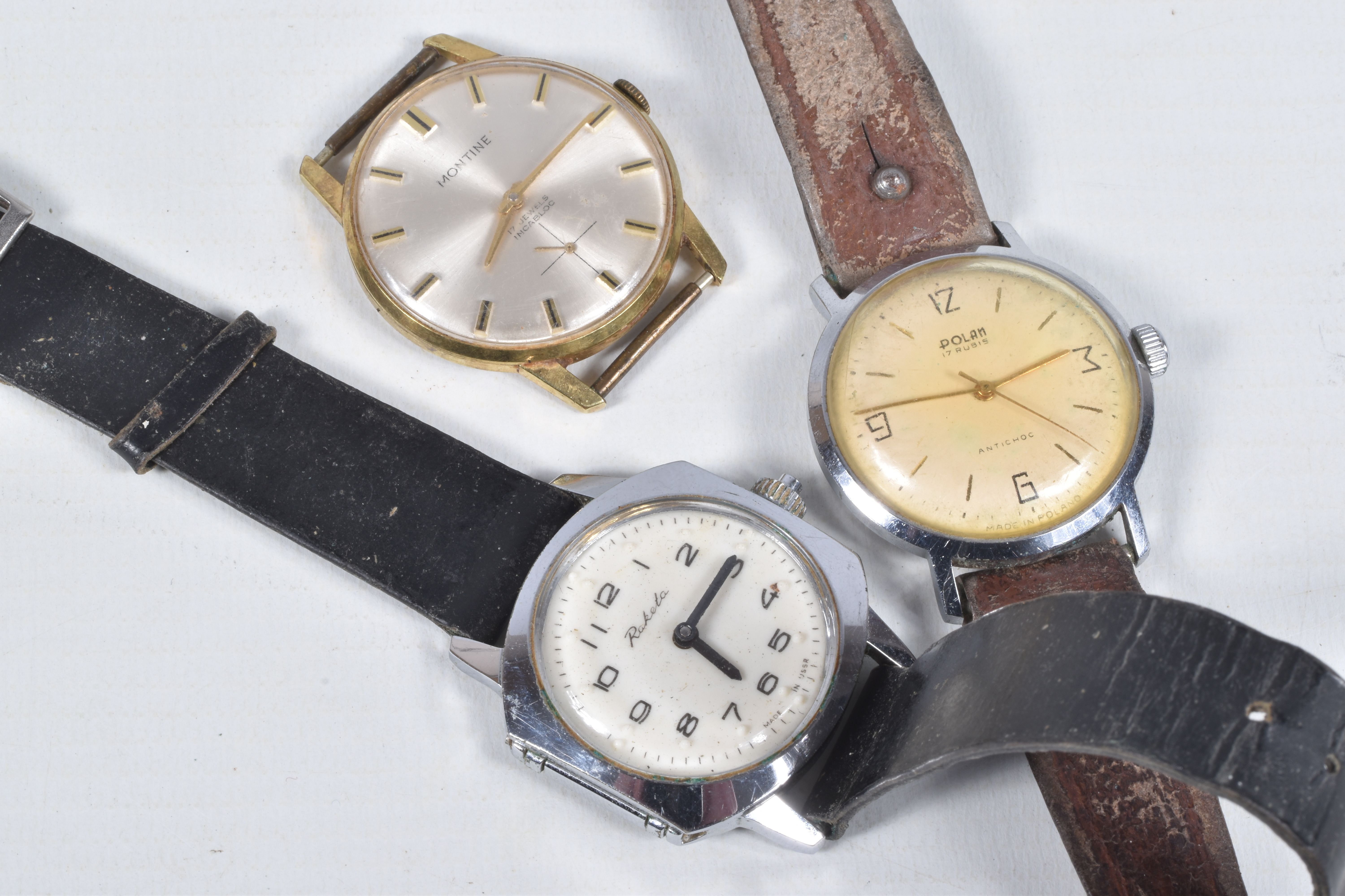THREE WRISTWACTHES, to include a gold plated, manual wind 'Montine' watch head, a 'Polan' manual