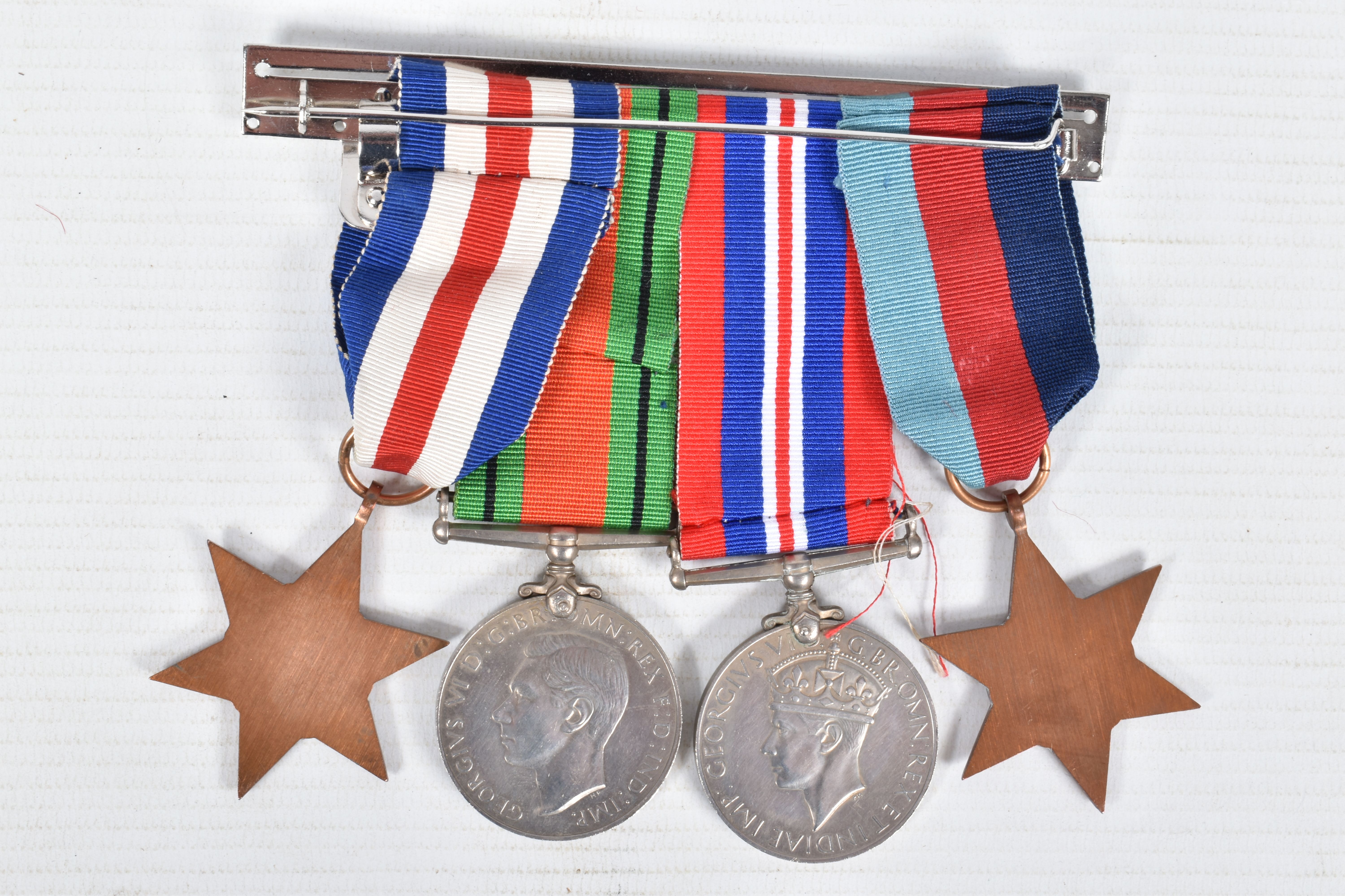 A PAIR OF WWI MEDALS AND FOUR WWII MEDALS, the WWI medals are correctly named to private 99551 Afred - Image 3 of 13