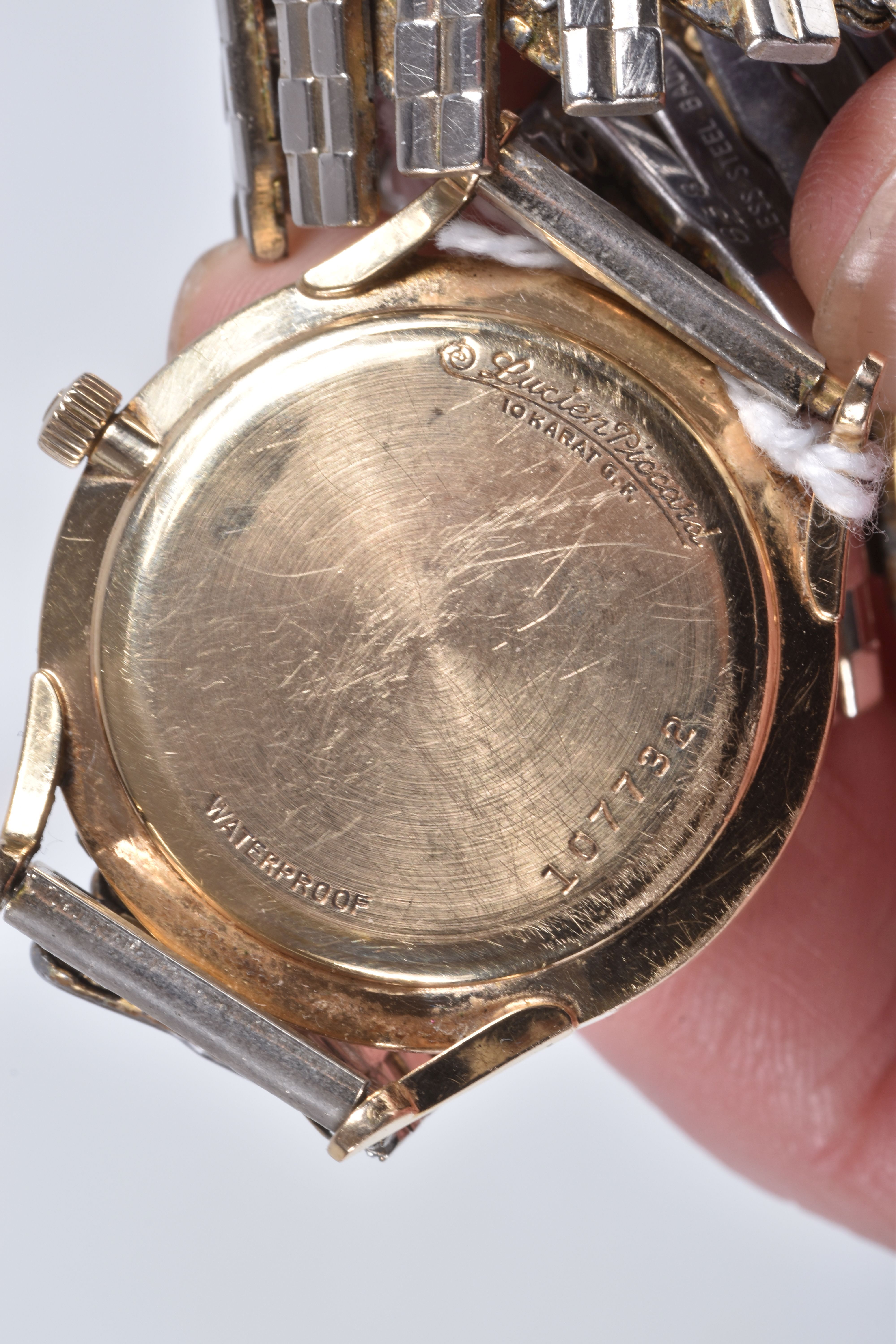 A GENTLEMAN'S WRISTWATCH, the circular face with gold coloured baton hour markers and hands, face - Image 4 of 5