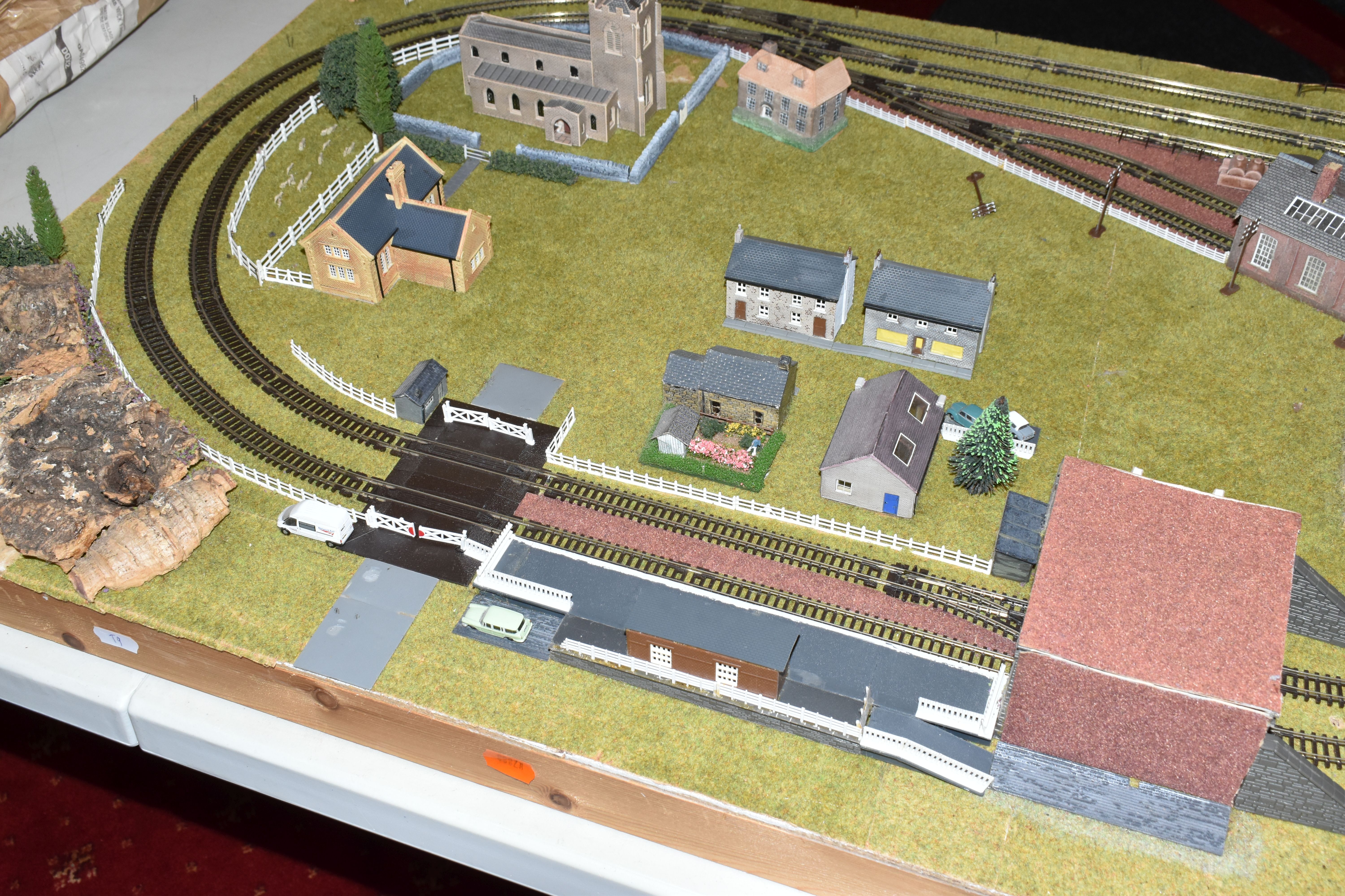 A TABLE TOP N GAUGE MODEL RAILWAY LAYOUT, hardboard base mounted on timber battens, oval double - Image 8 of 15