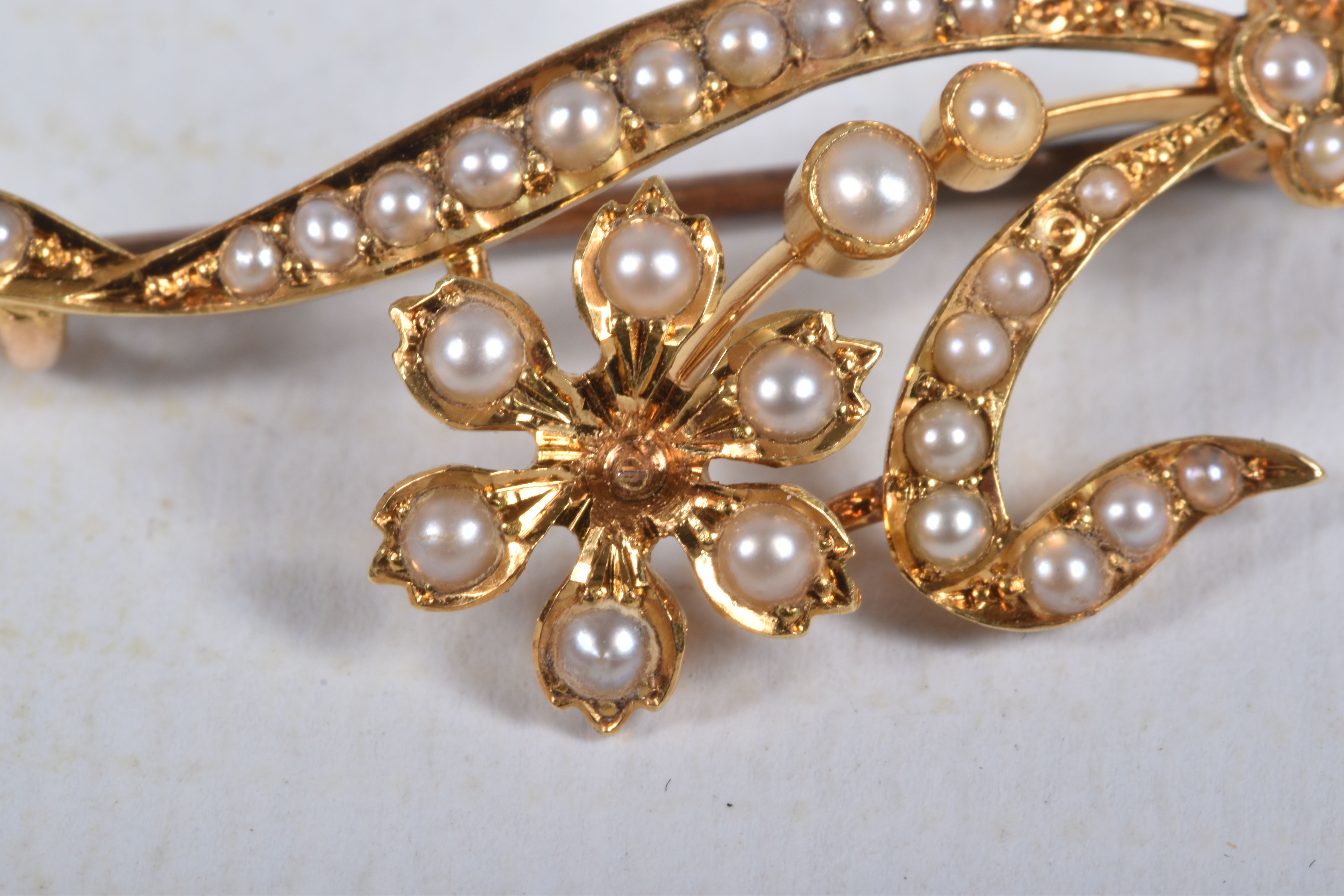 A SPLIT PEARL FLOWER BROOCH, unmarked, length 44mm, approximate weight 3.8 grams (condition - Image 2 of 4