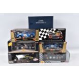 SEVEN BOXED DIECAST MODEL RACING VEHICLES, the first a 1:18 scale Quartzo Classic Grand Prix Lotus