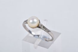 A CULTURED PEARL AND DIAMOND RING, set with a cultured pearl, measuring approximately 6.7mm, to