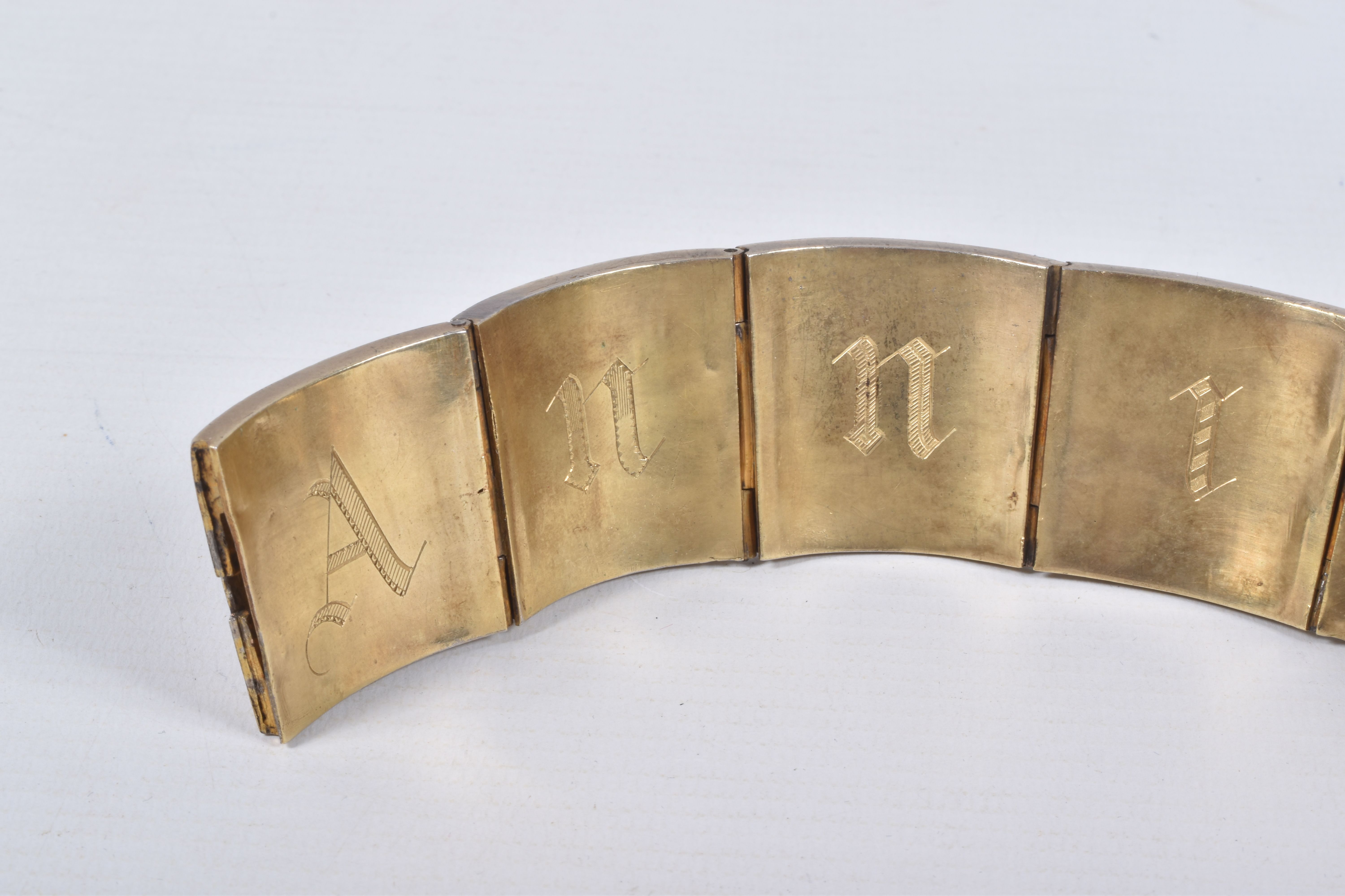 A VICTORIAN GILT BRACELET, comprised of six slightly tapered panels, embossed with an Indian design, - Image 3 of 5