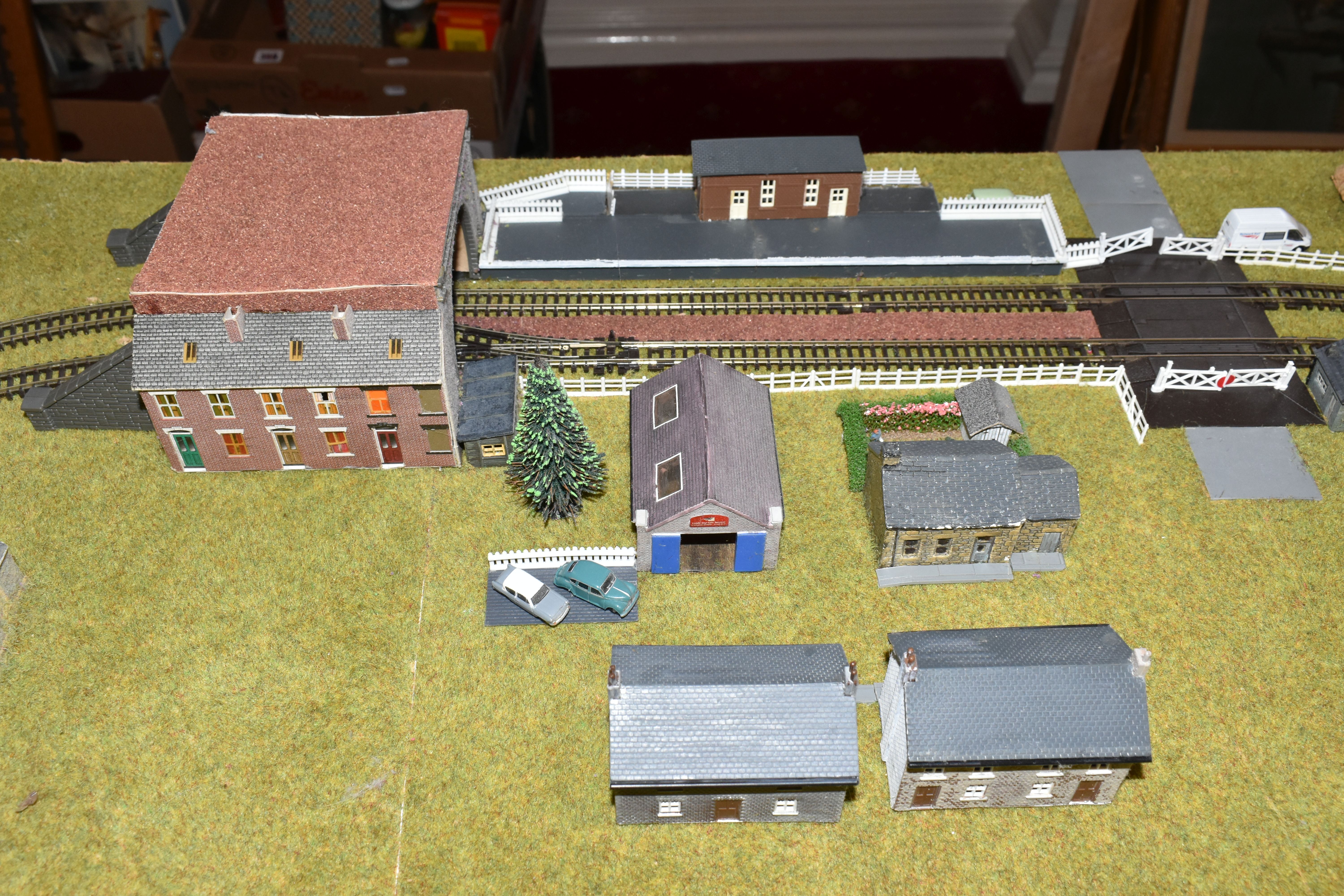 A TABLE TOP N GAUGE MODEL RAILWAY LAYOUT, hardboard base mounted on timber battens, oval double - Image 2 of 15
