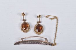 A CRESCENT BROOCH AND A PAIR OF EARRINGS, the crescent brooch, set with a row of graduating circular