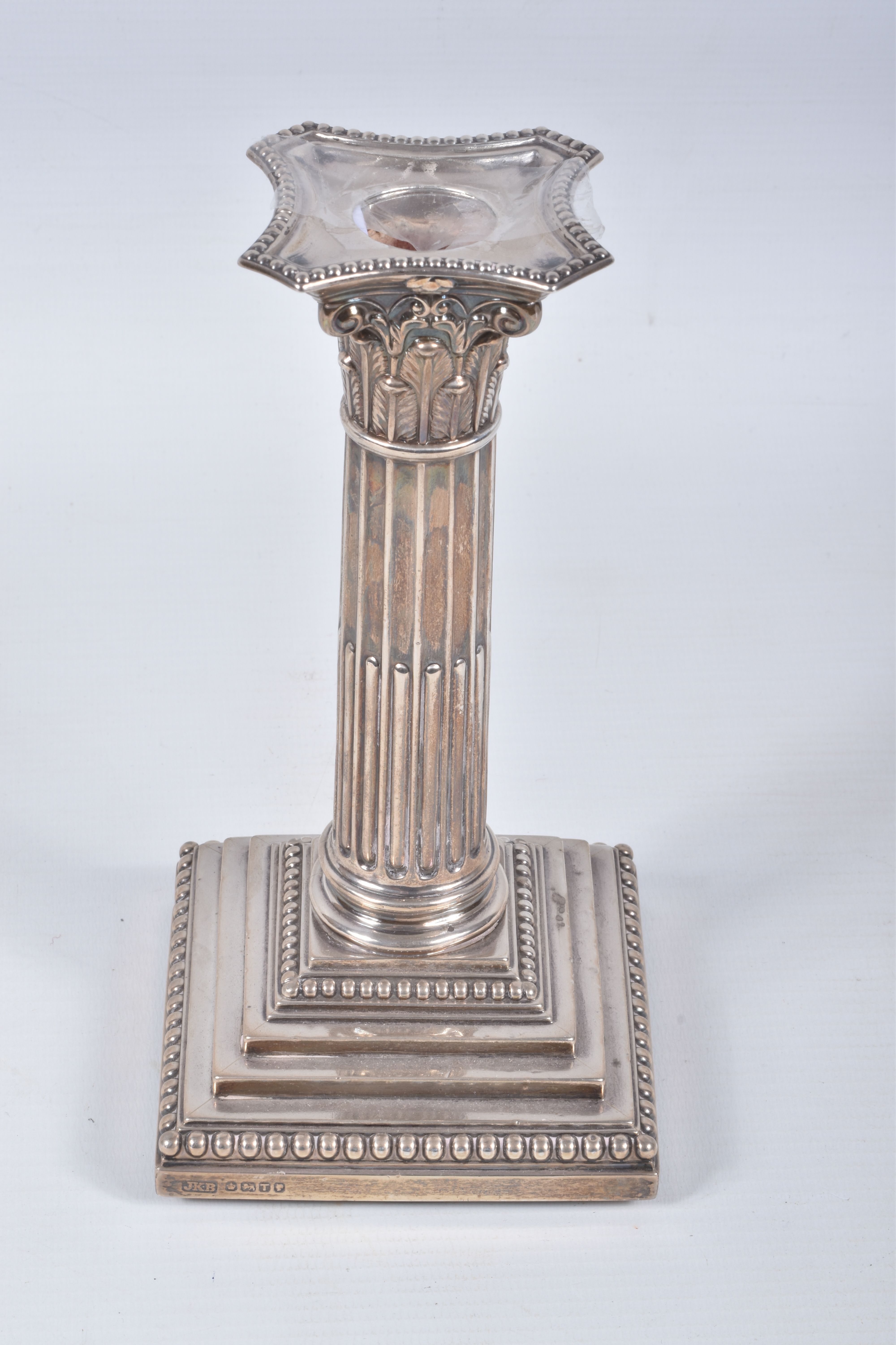 A PAIR OF LATE VICTORIAN SILVER CANDLE STICKS, Corinthian columns scroll leaf detail, on square - Image 2 of 8