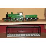 A FIVE INCH GAUGE MODEL OF A NORTH EASTERN RAILWAY CLASS F 4-4-0 LOCOMOTIVE AND TENDER, No.779, in