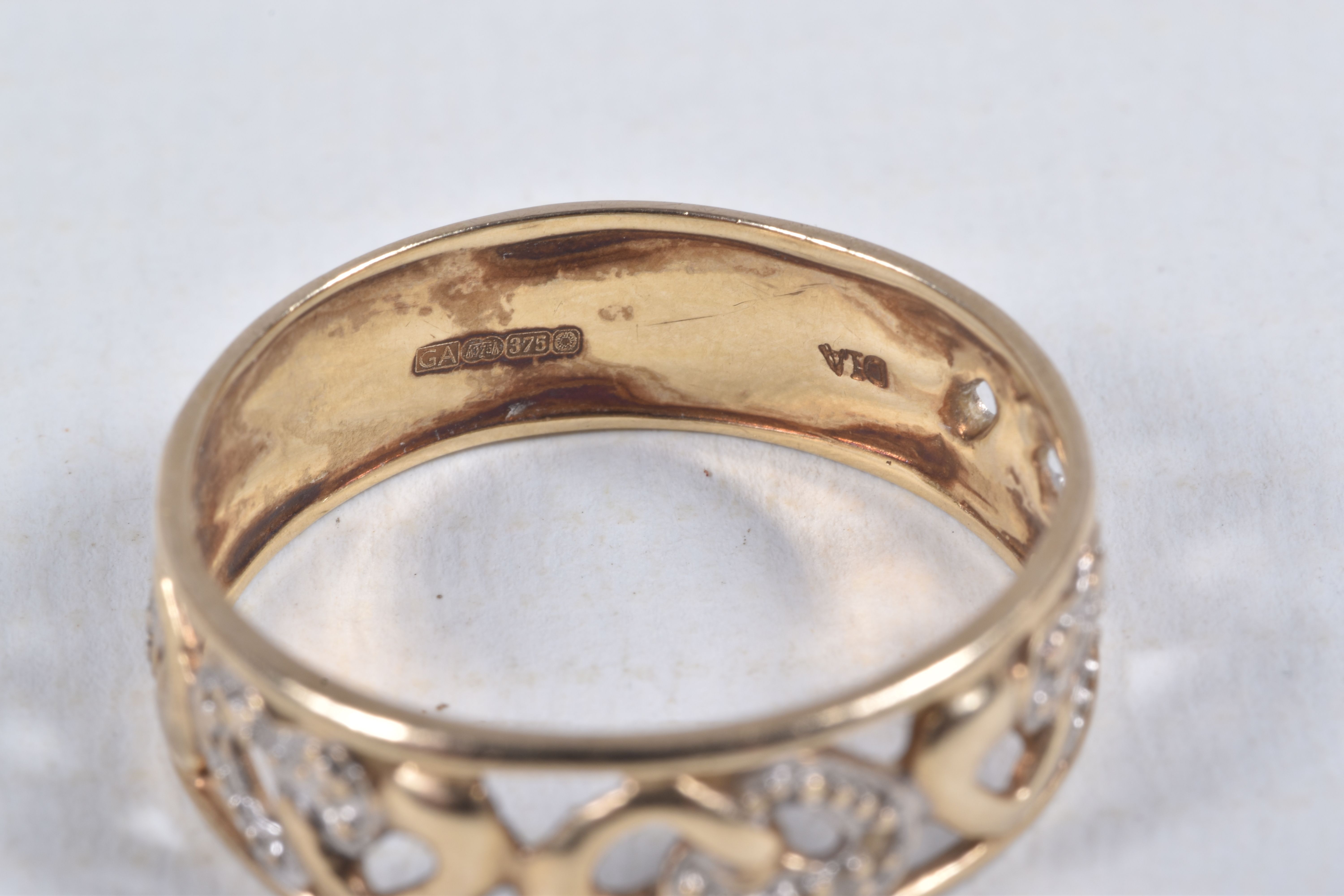 A 9CT GOLD BAND RING, open work wide band, detailed with hearts set with single cut diamond accents, - Image 4 of 4