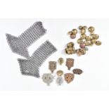 A SMALL COLLECTION OF CAP BADGES, collar badges uniform badges and some small items of chainmail,