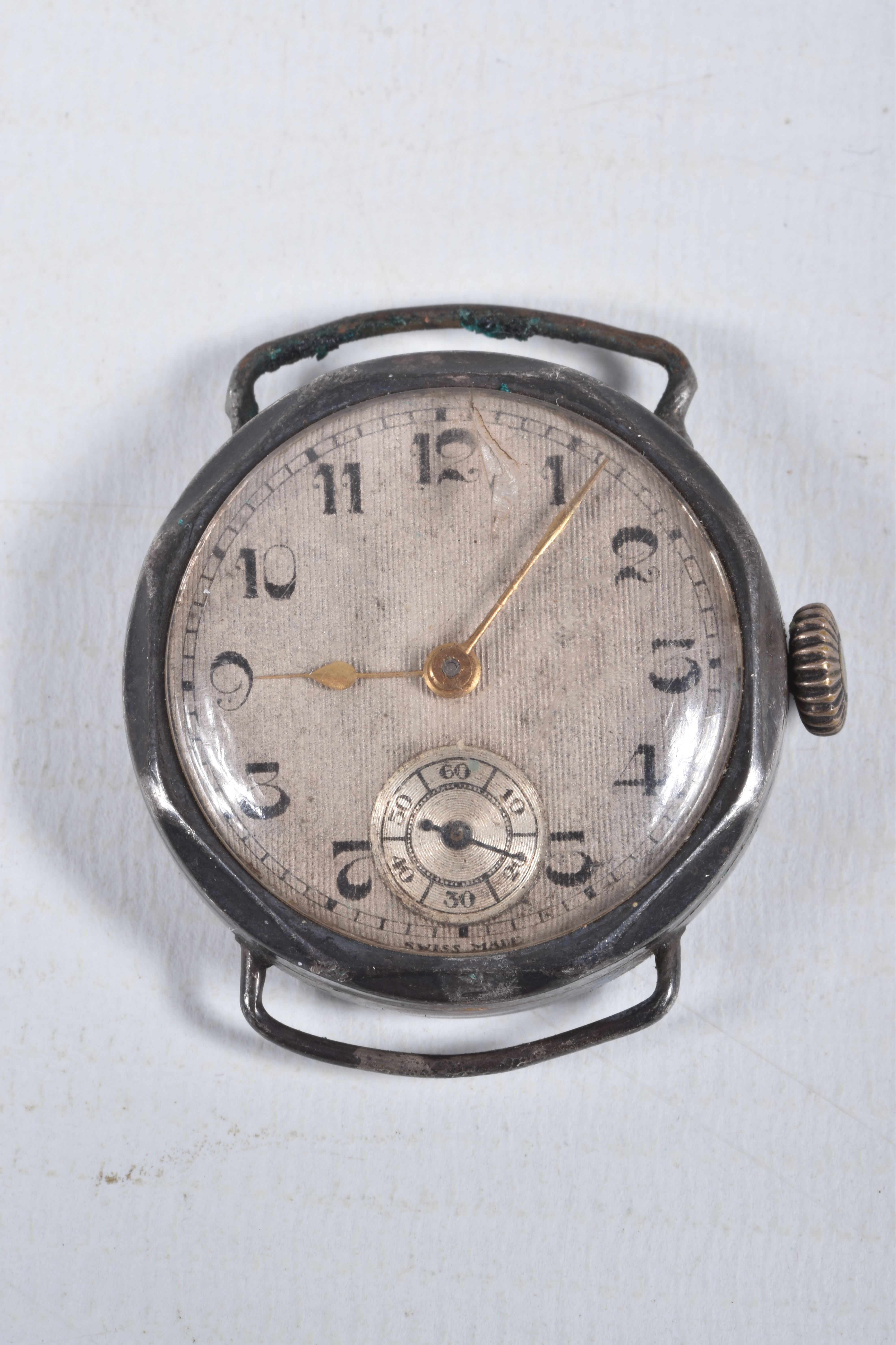 FOUR MID 20TH CENTURY WATCH HEADS, to include a white metal 'Olma' watch head, missing crown, - Image 6 of 9