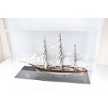 A CONSTRUCTED REVELL PLASTIC KIT OF THE CUTTY SARK HOUSED IN A PERSPEX DISPLAY CASE, kit has been