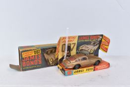 A BOXED CORGI TOYS JAMES BOND ASTON MARTIN DB5, No.261, playworn condition with some paint loss