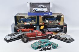FIVE BOXED AND FOUR LOOSE MODEL VEHICLES, boxed models include a 1:18 scale Maisto Aston Martin
