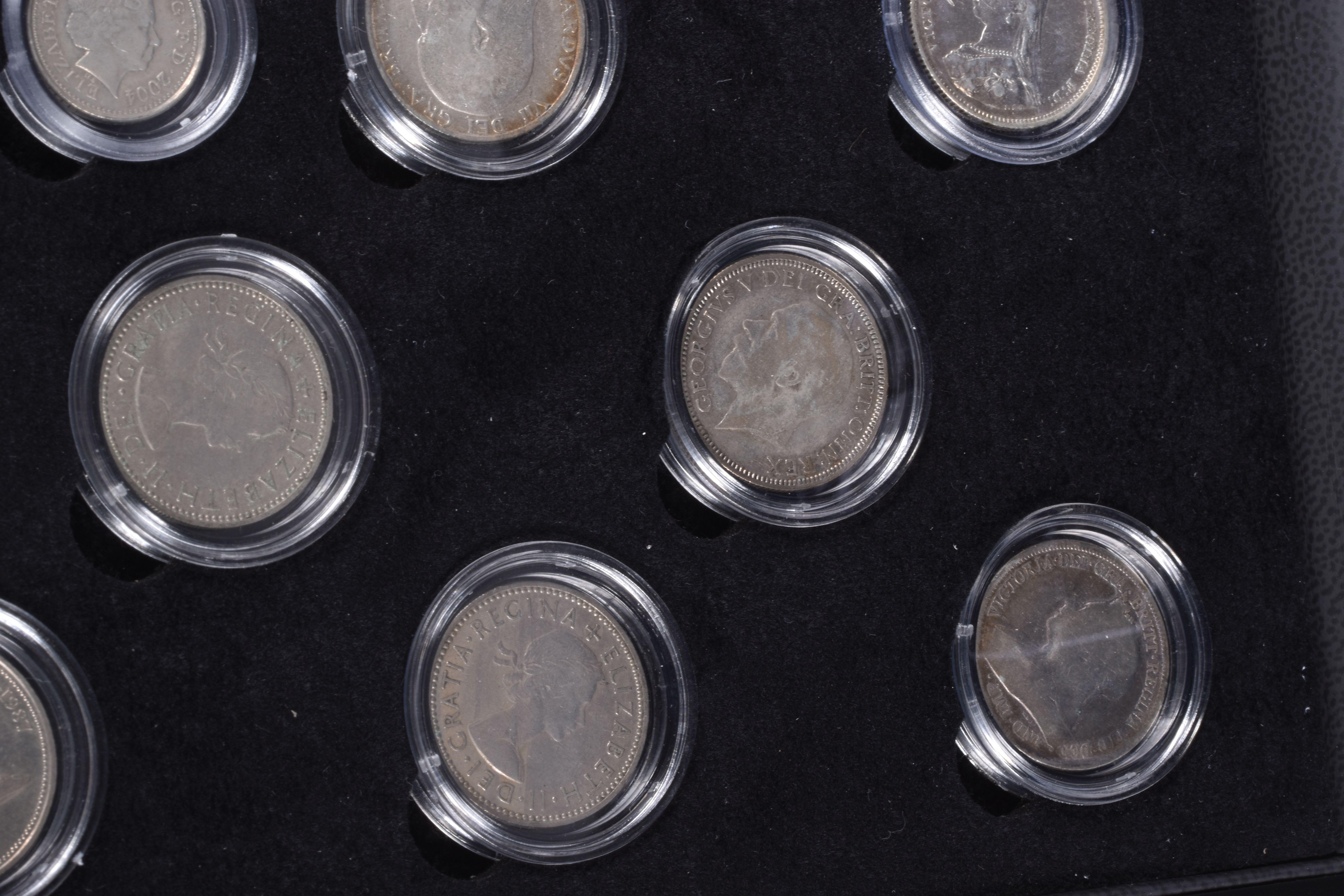 A CASED SET OF COMMEMORATIVE COINS, The House of Windsor coinage portraits shilling set by The - Image 4 of 9