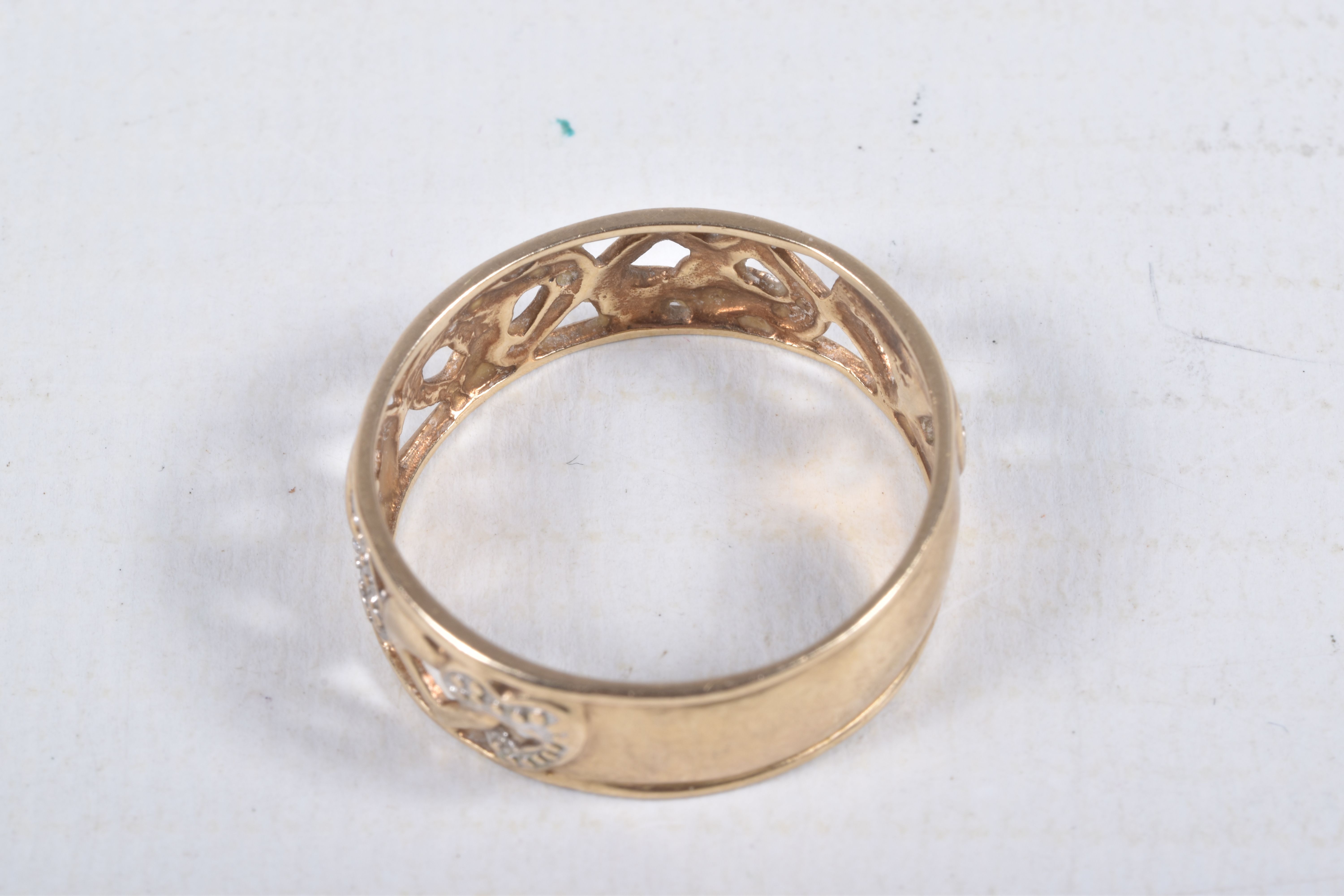 A 9CT GOLD BAND RING, open work wide band, detailed with hearts set with single cut diamond accents, - Image 3 of 4