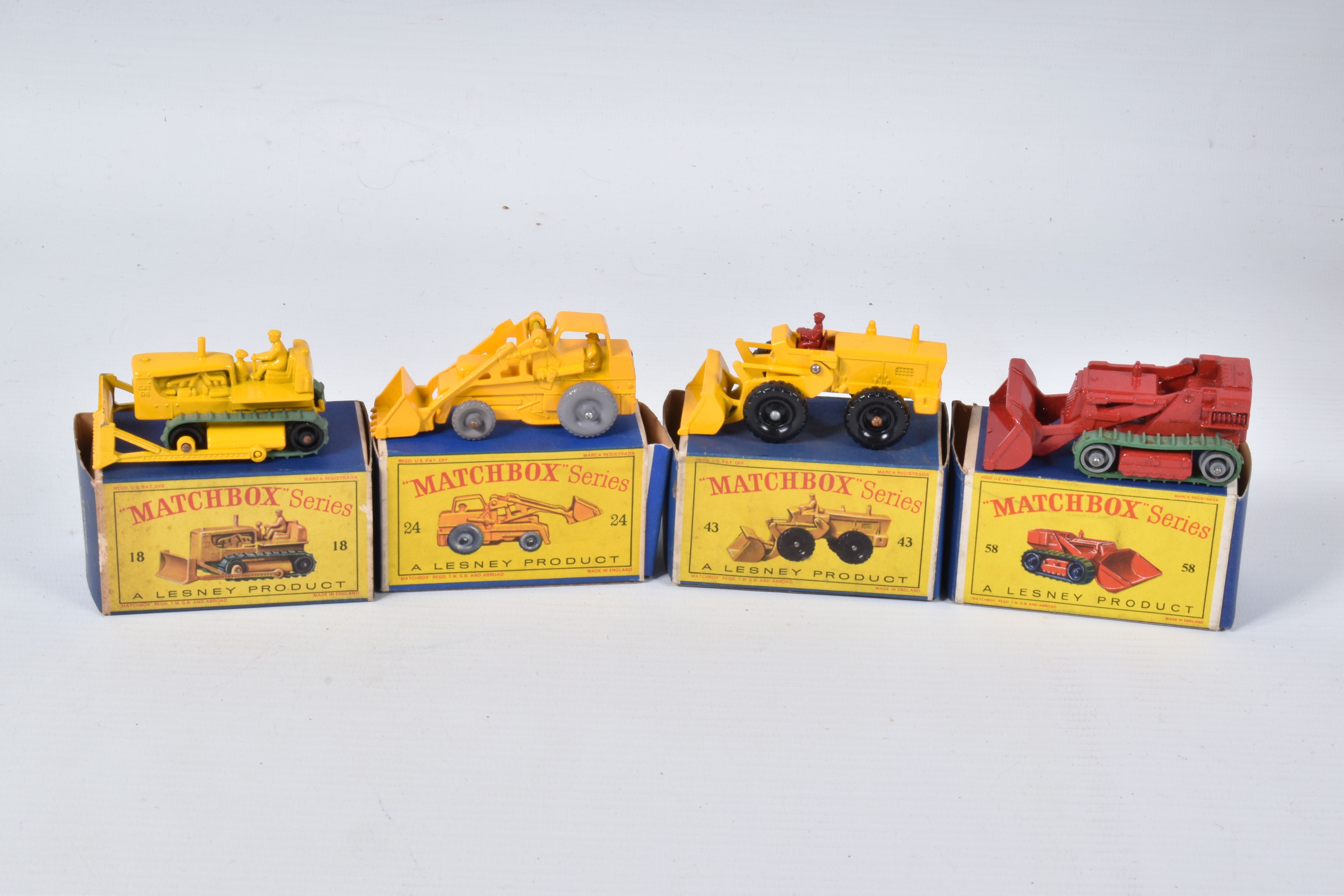 FOUR BOXED MATCHBOX SERIES DIECAST CONSTRUCTION VEHICLES, Caterpillar Bulldozer, No.18, green