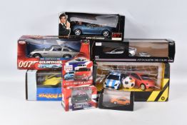 A COLLECTION OF BOXED MODEL AND RC CARS, to include a Minichamps Lotus Esprit Orange Pearl, box worn