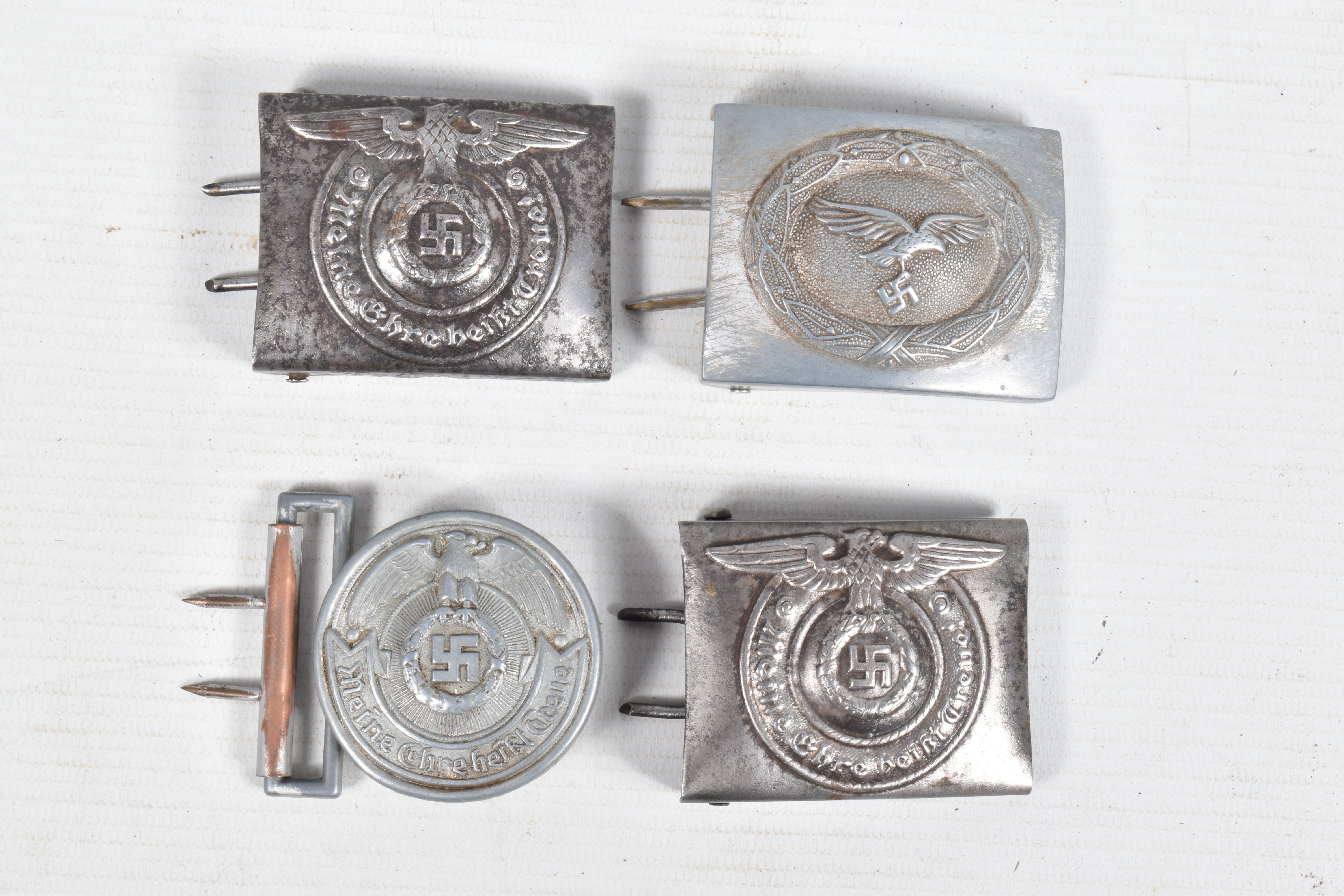 FOUR GERMAN WWII STYLE BELT BUCKLES, these buckles include one Luftwaffe and three SS buckles, the - Image 2 of 11