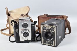 TWO KODAK CAMERAS INCLUDING A SIX-20 BROWNIE E AND A BROWNIE REFLEX 20, the boxed brownie comes in