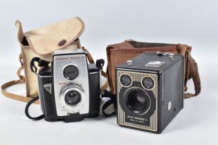 TWO KODAK CAMERAS INCLUDING A SIX-20 BROWNIE E AND A BROWNIE REFLEX 20, the boxed brownie comes in