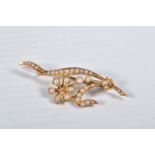 A SPLIT PEARL FLOWER BROOCH, unmarked, length 44mm, approximate weight 3.8 grams (condition