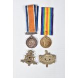 A WWI PAIR OF DURHAM LIGHT INFANTRY MEDALS AND TWO CAP BADGES, the medals are both correctly named