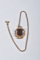 A 9CT SMOKY QUARTZ PENDANT NECKLACE, the rectangular smoky quartz in a claw setting to the scrolling