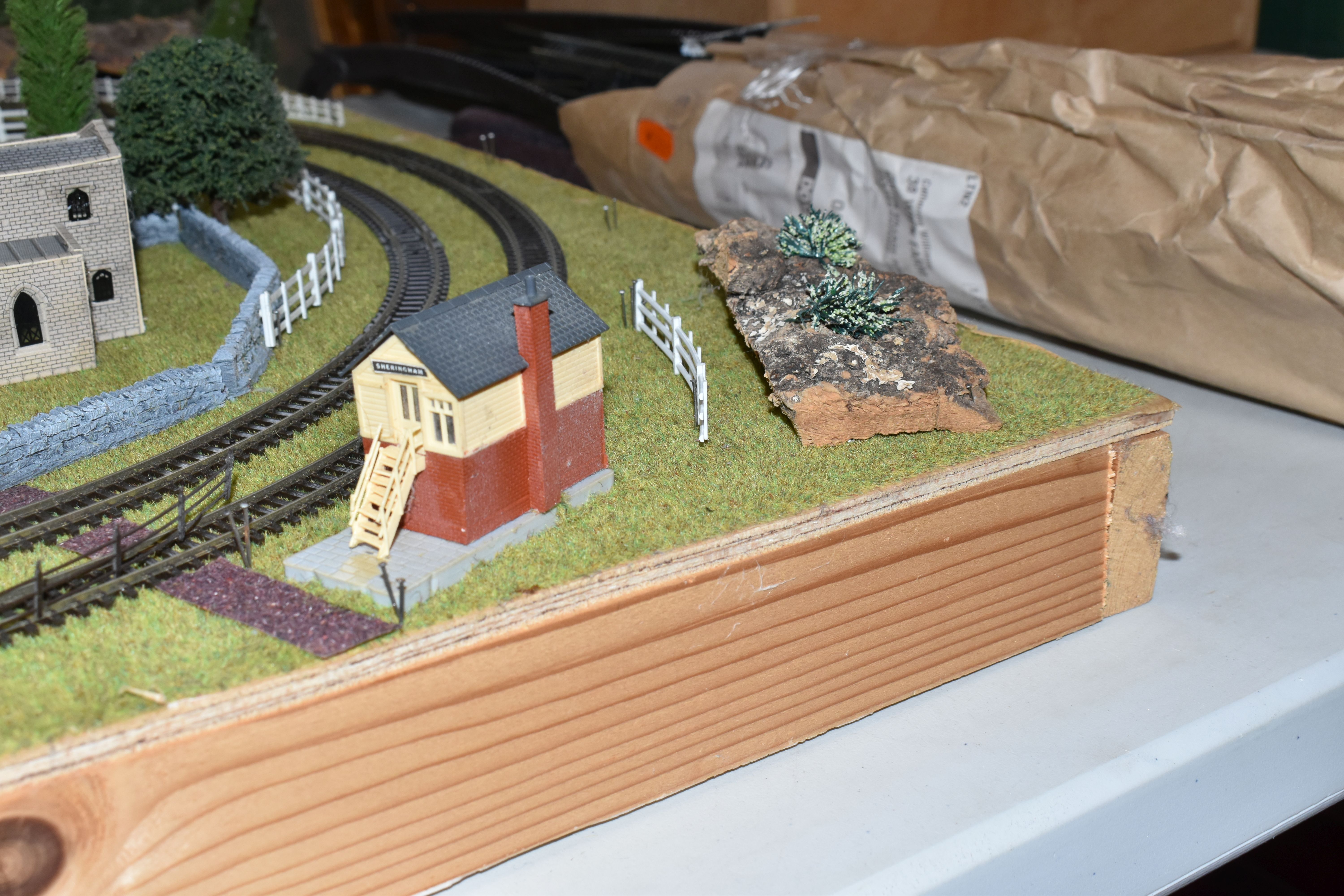 A TABLE TOP N GAUGE MODEL RAILWAY LAYOUT, hardboard base mounted on timber battens, oval double - Image 6 of 15