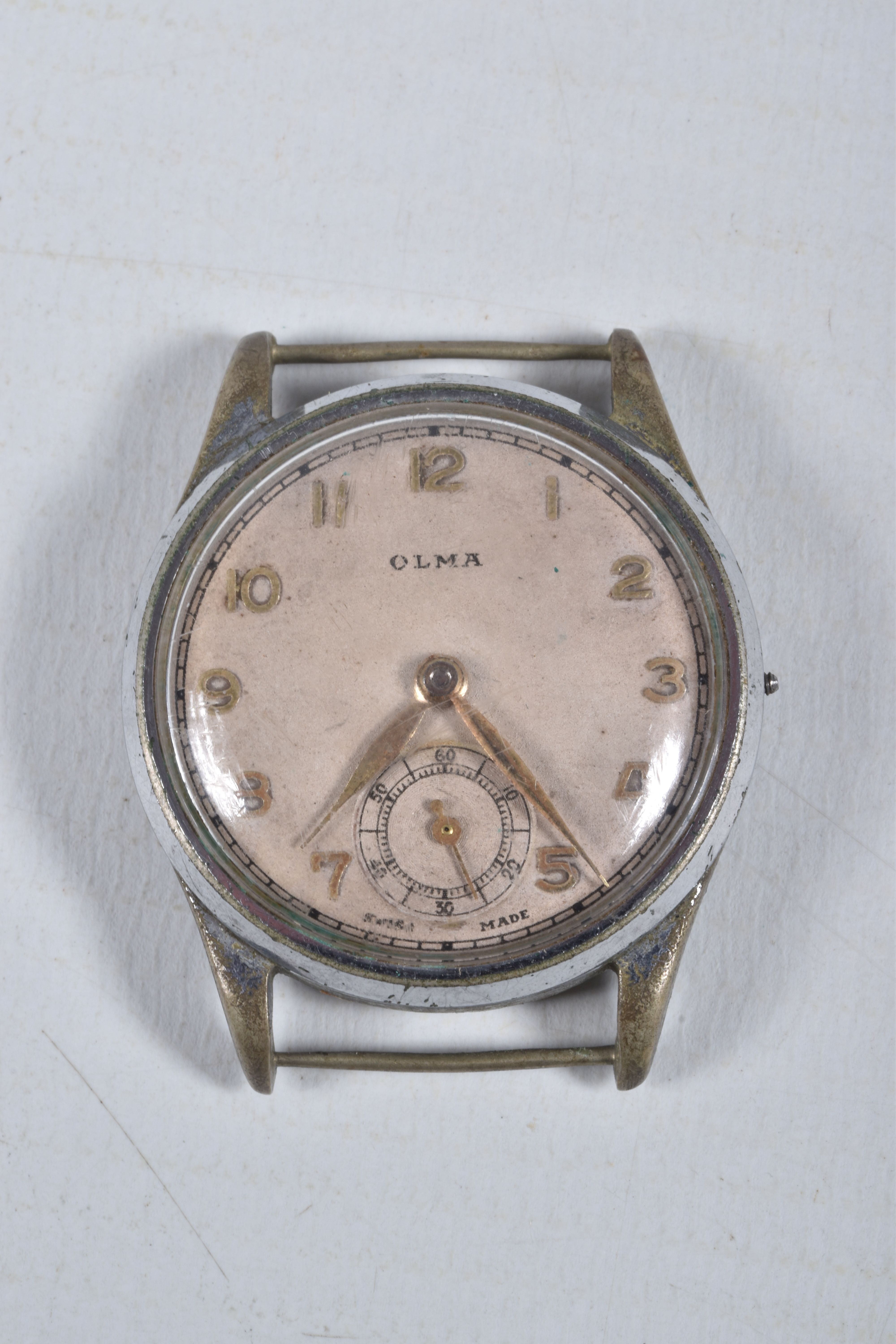 FOUR MID 20TH CENTURY WATCH HEADS, to include a white metal 'Olma' watch head, missing crown, - Image 2 of 9