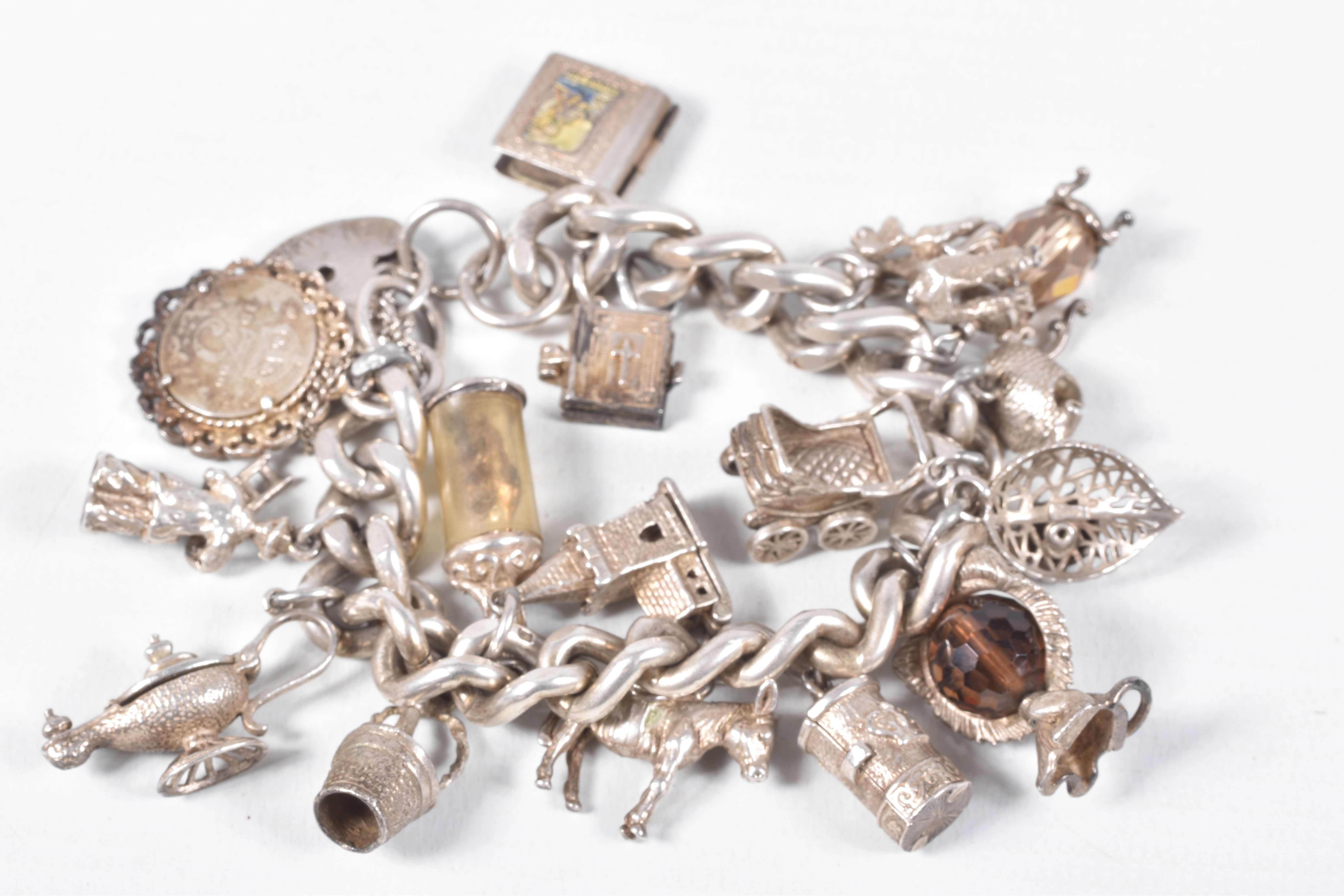 A SILVER CHARM BRACELET, a heavy curb link bracelet fitted with a heart padlock clasp, hallmarked ' - Image 7 of 7