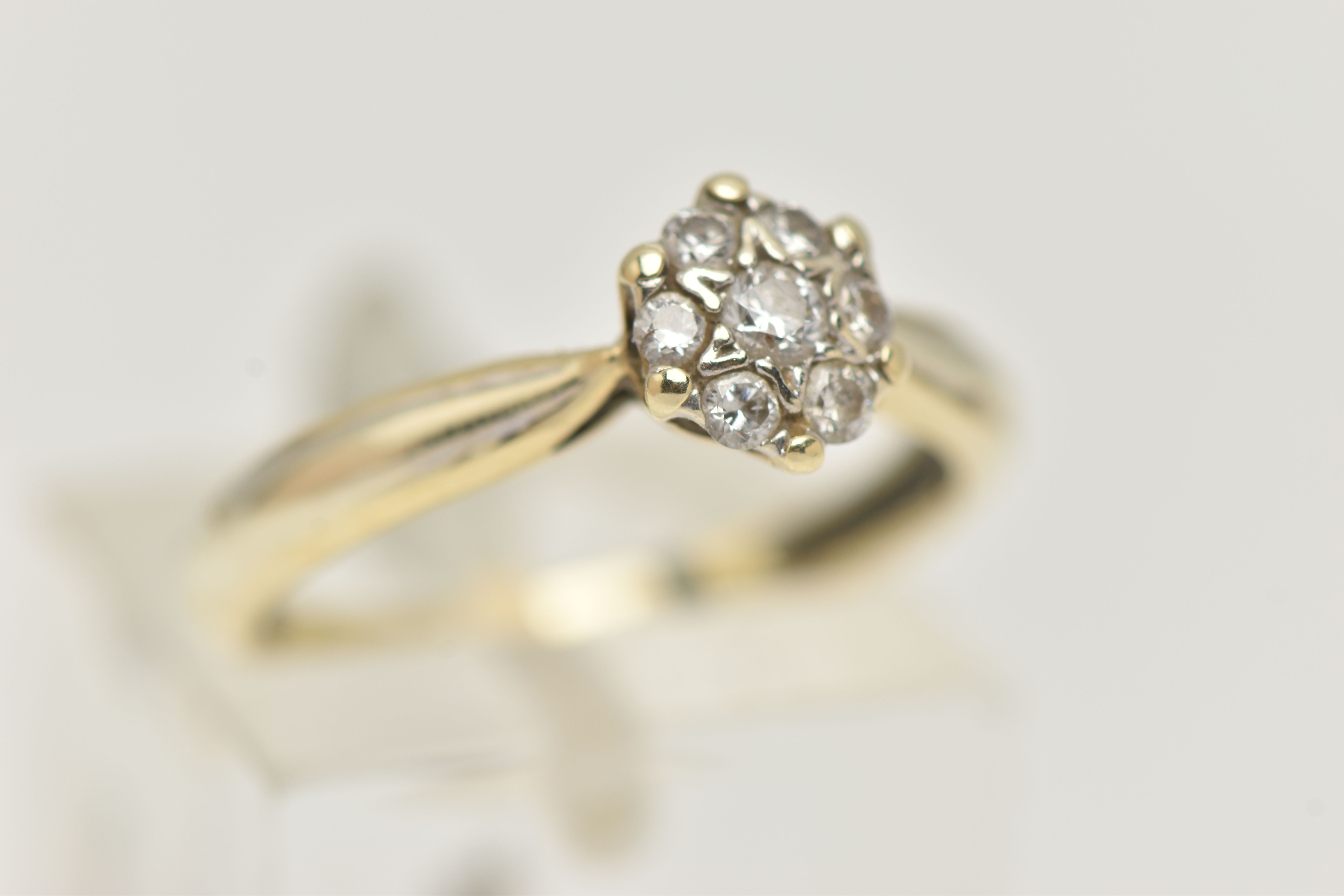 A 9CT GOLD DIAMOND CLUSTER RING, small circular cluster set with seven round brilliant cut diamonds, - Image 4 of 4