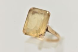 A 9CT GOLD GEM SET RING, a rectangular cut citrine prong set in rose gold, approximate stone
