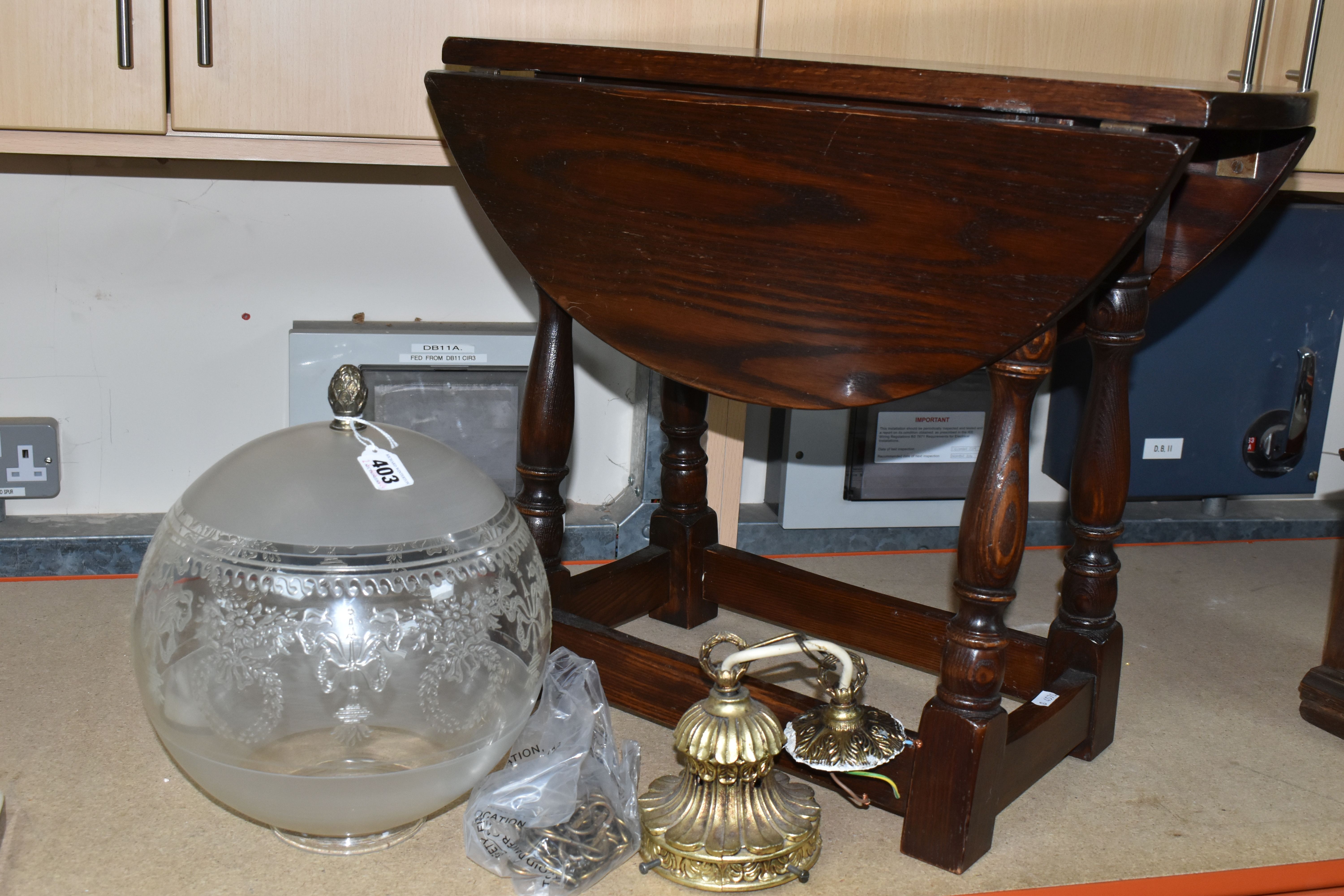 A SMALL DROP LEAF SIDE TABLE AND GLASS LIGHT SHADE, comprising a dark oak dropleaf side table by - Image 6 of 6