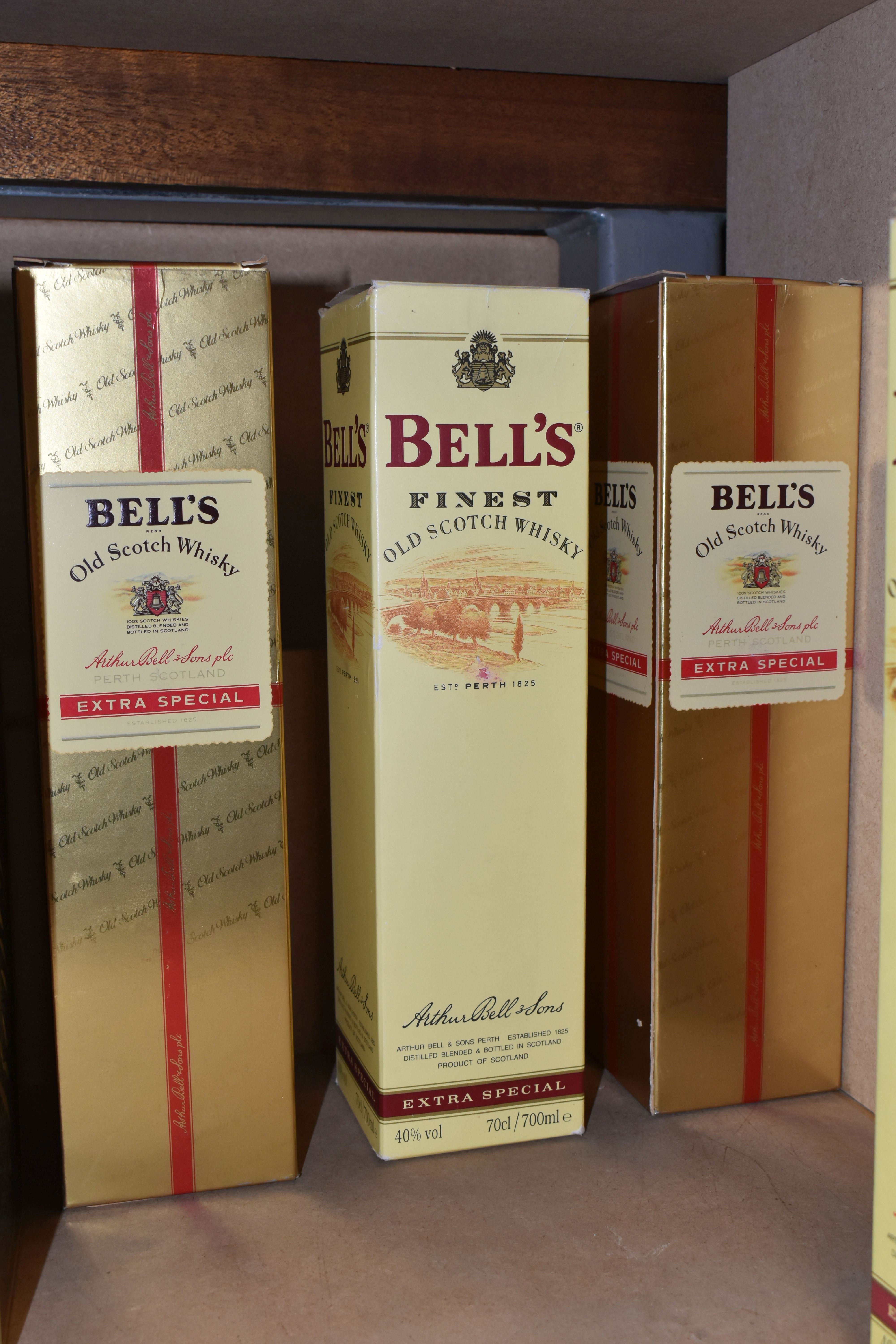 SIX BOTTLES OF WHISKY comprising four bottles of BELL'S Extra Special, 40% vol. 75cl, fill levels - Image 2 of 2