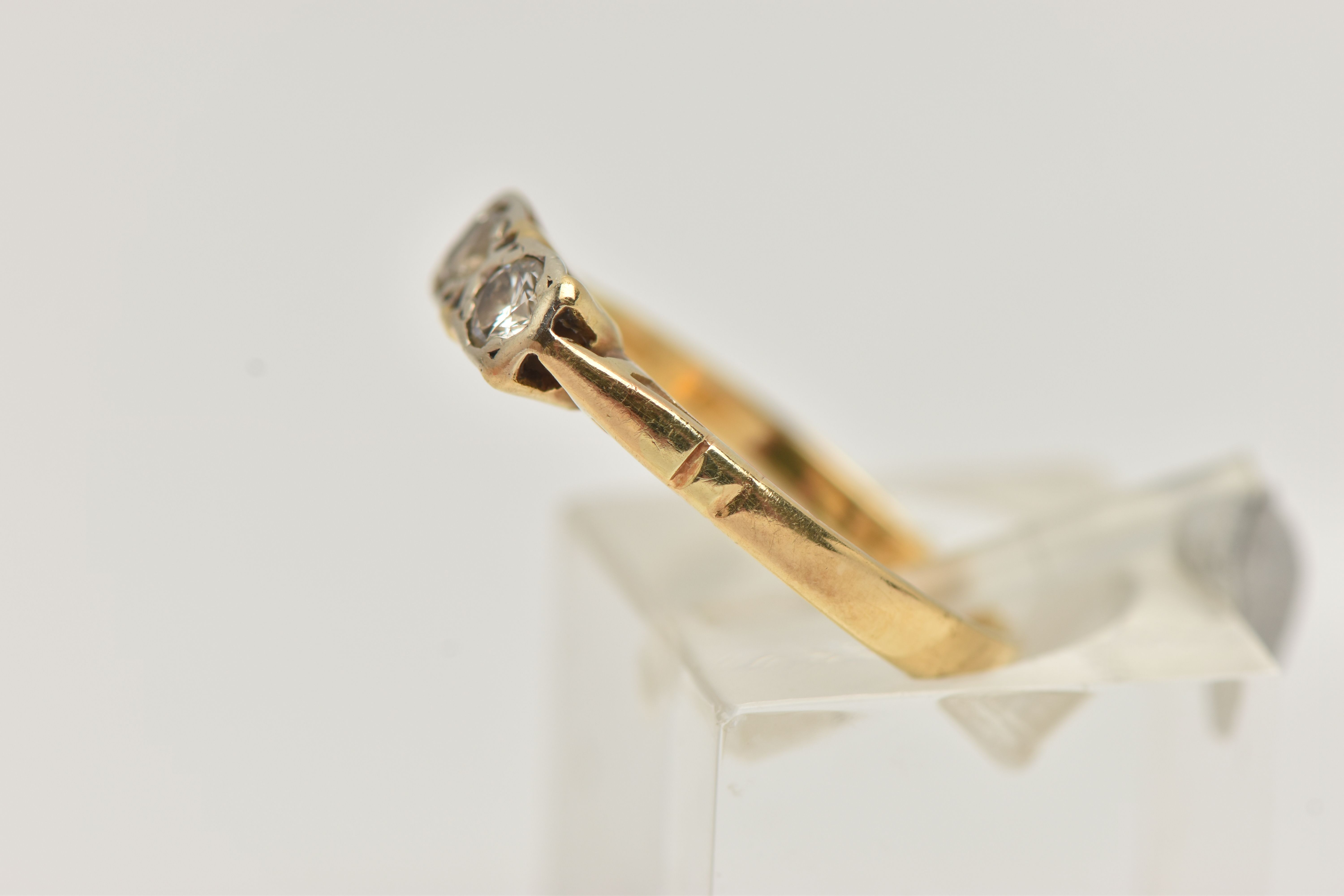 A DIAMOND TWO STONE RING, set with round brilliant cut diamonds, each measuring approximately 3. - Image 2 of 4