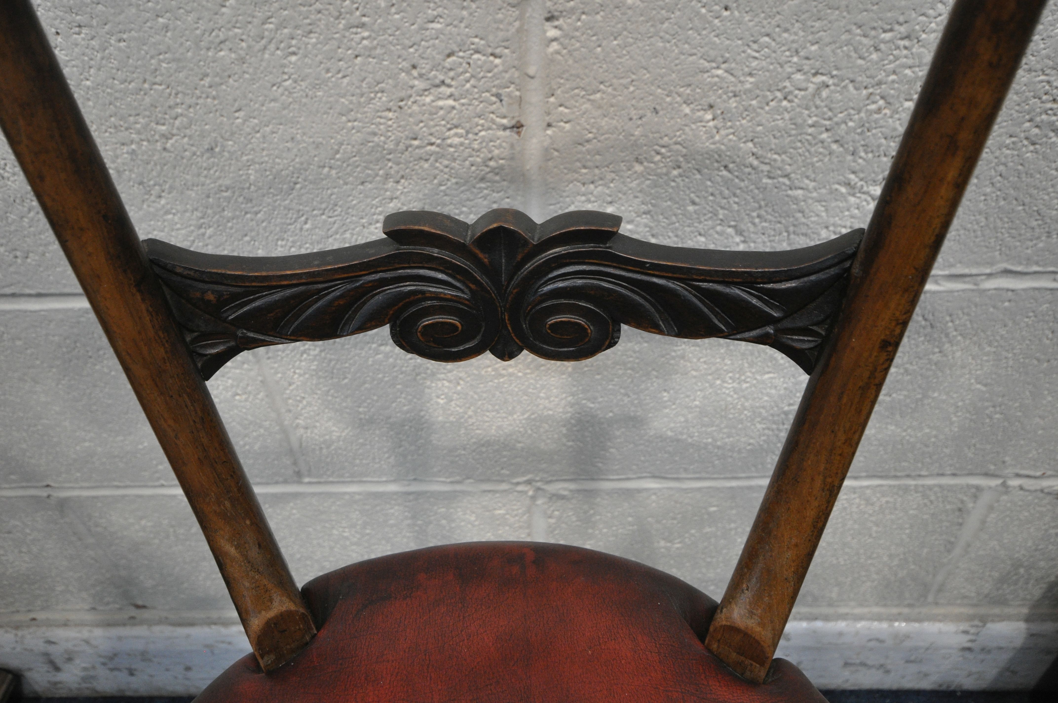 A 19TH CENTURY ROSEWOOD MUSICIAN / HARPIST SWIVEL CHAIR, with scrolled and foliate backrest, oxblood - Image 3 of 7