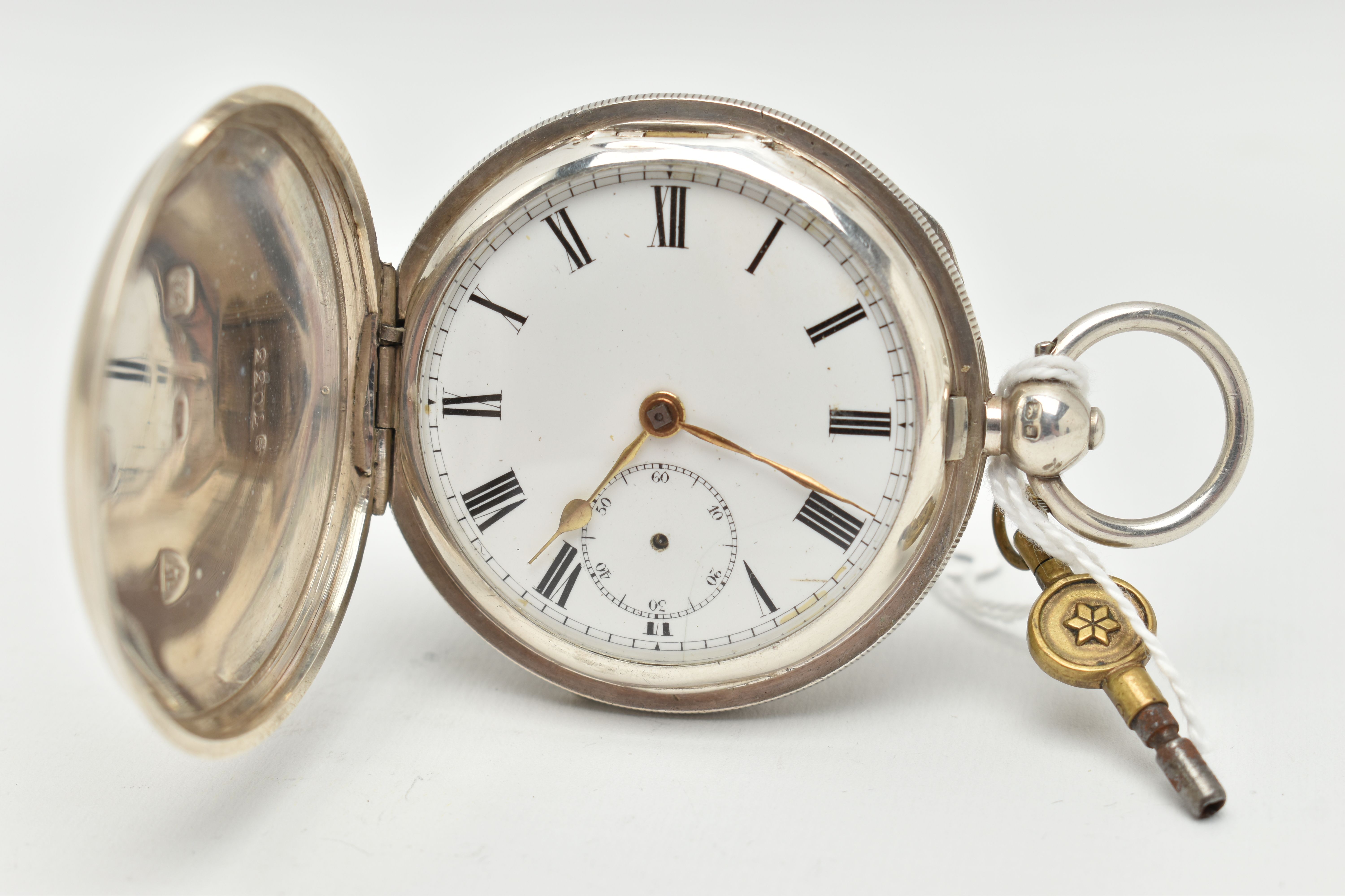 AN EDWARDIAN SILVER FULL HUNTER POCKET WATCH, key wound movement, Roman numerals, second