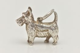 A WHITE METAL CHARM, in the form of a terrier dog, stamped 'Silver', fitted with a jump ring for
