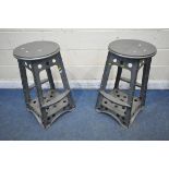 A PAIR OF INDUSTRIAL AVIATION STYLE BAR STOOLS, with circular seat, splayed legs and two