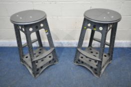 A PAIR OF INDUSTRIAL AVIATION STYLE BAR STOOLS, with circular seat, splayed legs and two