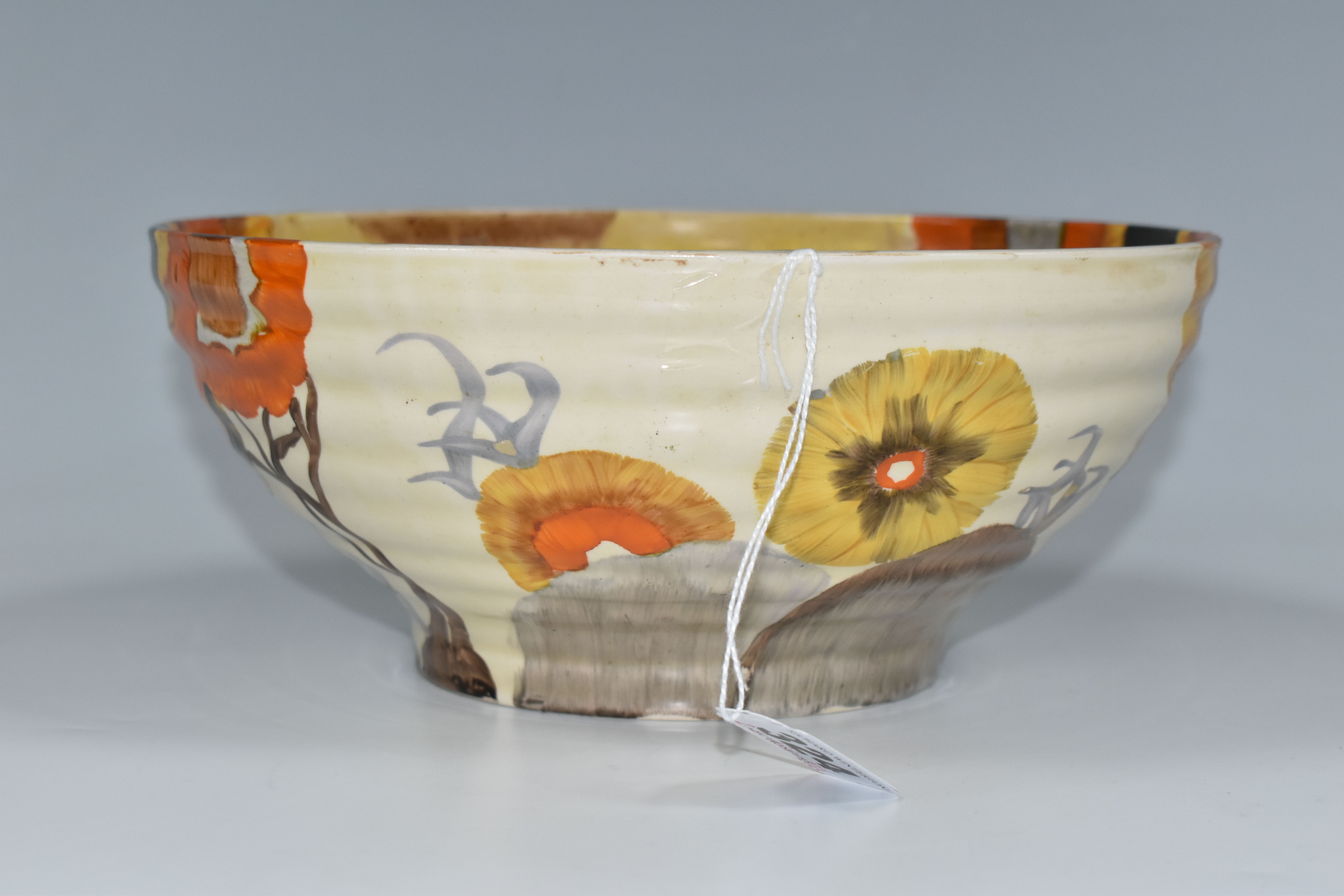 A CLARICE CLIFF BIZARRE BOWL, in Rhodanthe pattern, the ribbed bowl painted with flowers in autumnal - Image 3 of 6