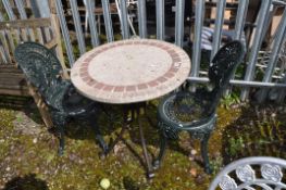 A PAIR OF GREEN PAINTED CAST ALUMINIUM GARDEN CHAIRS with ornate pierced detailing to legs, seat and