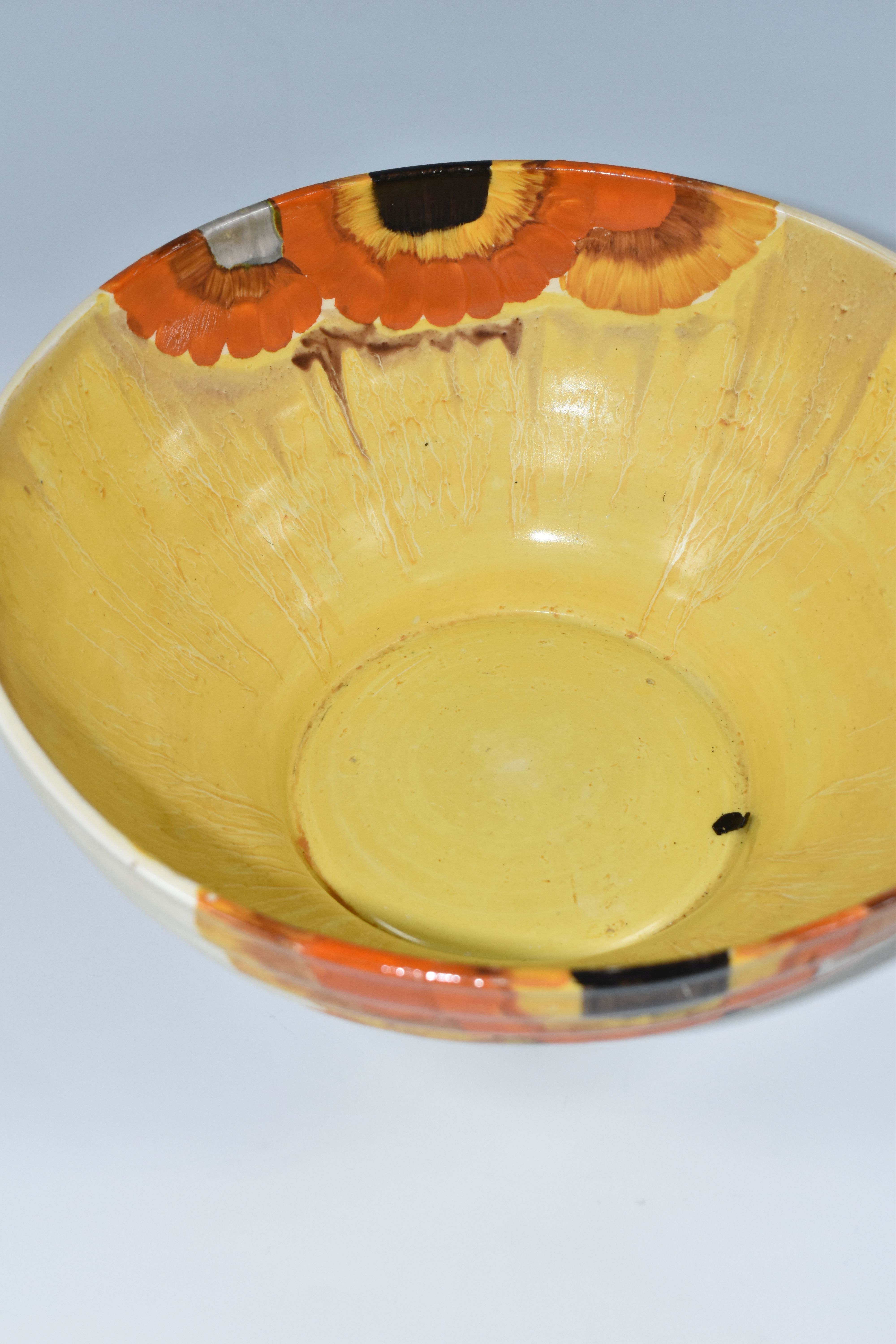 A CLARICE CLIFF BIZARRE BOWL, in Rhodanthe pattern, the ribbed bowl painted with flowers in autumnal - Image 5 of 6