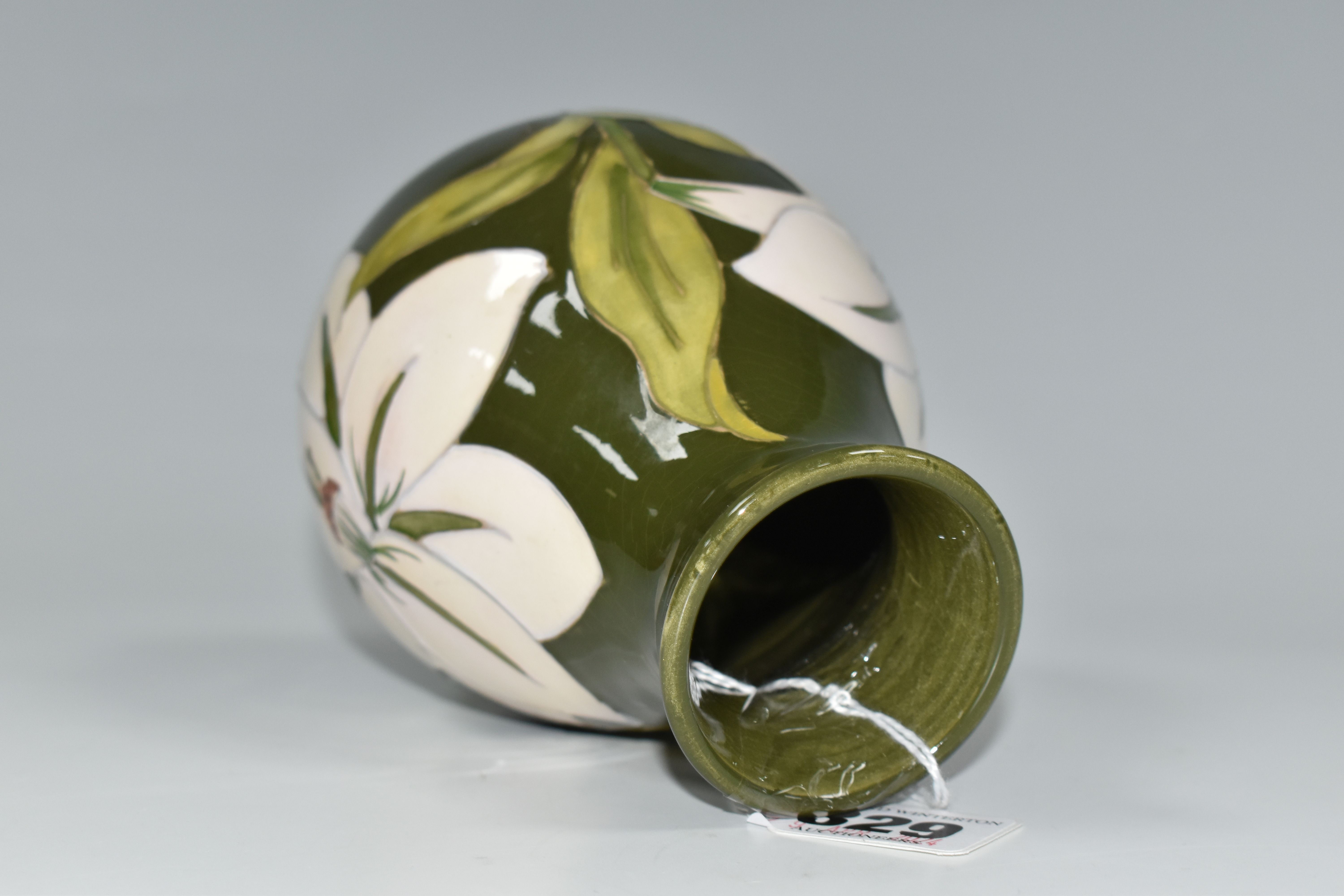 A MOORCROFT POTTERY 'BERMUDA LILY' PATTERN BALUSTER VASE, tube lined with white lilies on a green - Image 4 of 5