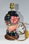 A MOORCROFT POTTERY 'OBERON' LAMP BASE, designed by Rachel Bishop, height 23cm including wood